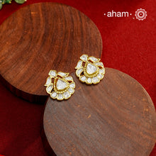 These expertly crafted studs feature 92.5% sterling silver with a refined gold polish finish, elegantly set with brilliant moissanite stones. Designed to offer lasting shine and sophistication making them a perfect choice for both everyday wear and special occasions. 