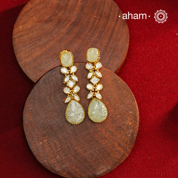 Expertly crafted earrings in 92.5% sterling silver with a refined gold polish finish and elegantly set with brilliant moissanite stones and green stone stud and drop. Designed to offer lasting shine and sophistication making them a perfect choice for special occasions.
