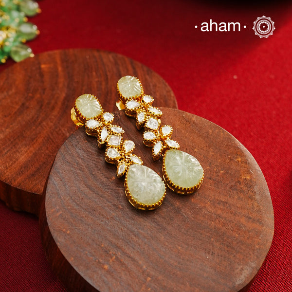 Expertly crafted earrings in 92.5% sterling silver with a refined gold polish finish and elegantly set with brilliant moissanite stones and green stone stud and drop. Designed to offer lasting shine and sophistication making them a perfect choice for special occasions.