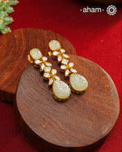 Expertly crafted earrings in 92.5% sterling silver with a refined gold polish finish and elegantly set with brilliant moissanite stones and green stone stud and drop. Designed to offer lasting shine and sophistication making them a perfect choice for special occasions.&nbsp;