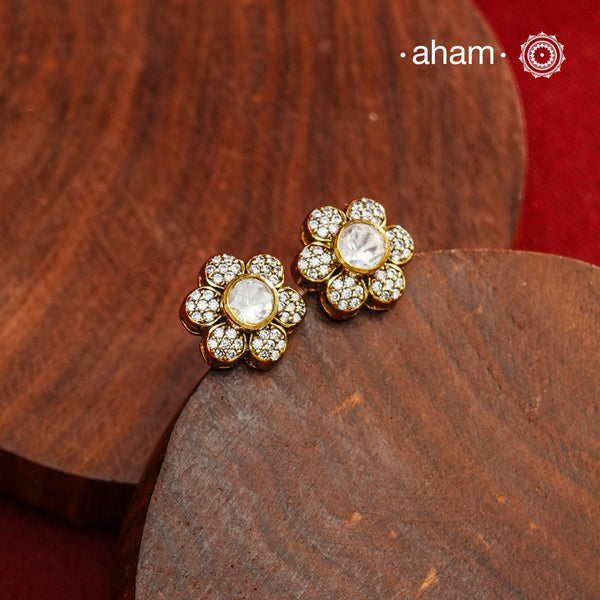 These expertly crafted studs feature 92.5% sterling silver with a refined gold polish finish, elegantly set with brilliant moissanite stones. Designed to offer lasting shine and sophistication making them a perfect choice for both everyday wear and special occasions.