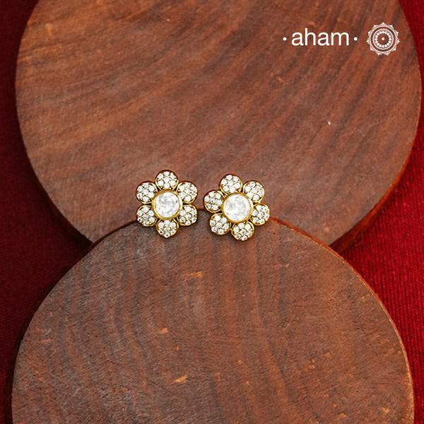 These expertly crafted studs feature 92.5% sterling silver with a refined gold polish finish, elegantly set with brilliant moissanite stones. Designed to offer lasting shine and sophistication making them a perfect choice for both everyday wear and special occasions.