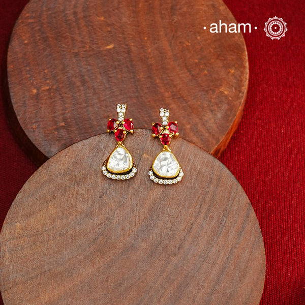 These expertly crafted studs feature 92.5% sterling silver with a refined gold polish finish, elegantly set with brilliant moissanite stones. Designed to offer lasting shine and sophistication making them a perfect choice for both everyday wear and special occasions.