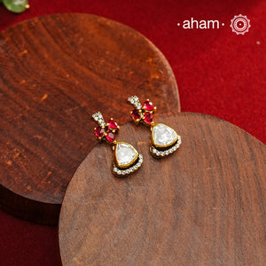 These expertly crafted studs feature 92.5% sterling silver with a refined gold polish finish, elegantly set with brilliant moissanite stones. Designed to offer lasting shine and sophistication making them a perfect choice for both everyday wear and special occasions.