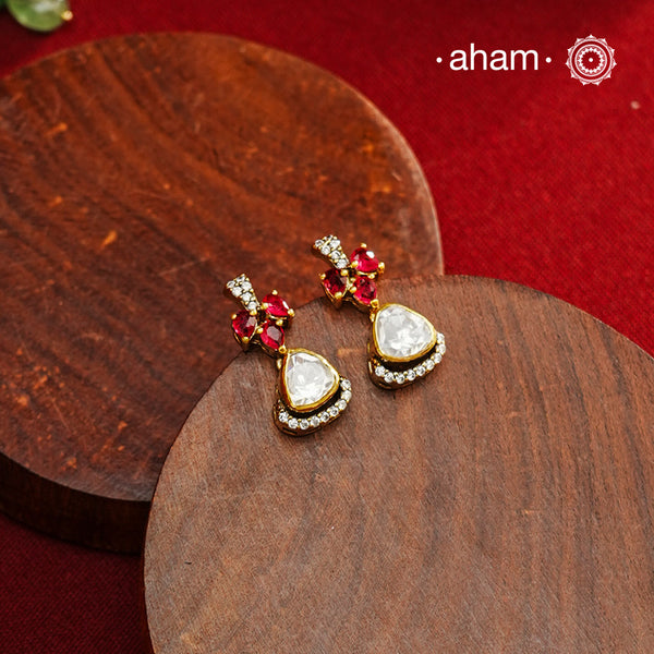 These expertly crafted studs feature 92.5% sterling silver with a refined gold polish finish, elegantly set with brilliant moissanite stones. Designed to offer lasting shine and sophistication making them a perfect choice for both everyday wear and special occasions.