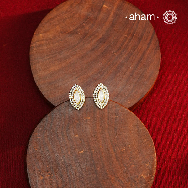 These expertly crafted studs feature 92.5% sterling silver with a refined gold polish finish, elegantly set with brilliant moissanite stones. Designed to offer lasting shine and sophistication making them a perfect choice for both everyday wear and special occasions.