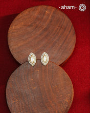 These expertly crafted studs feature 92.5% sterling silver with a refined gold polish finish, elegantly set with brilliant moissanite stones. Designed to offer lasting shine and sophistication making them a perfect choice for both everyday wear and special occasions.