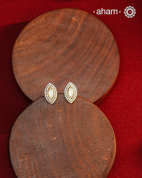 These expertly crafted studs feature 92.5% sterling silver with a refined gold polish finish, elegantly set with brilliant moissanite stones. Designed to offer lasting shine and sophistication making them a perfect choice for both everyday wear and special occasions.