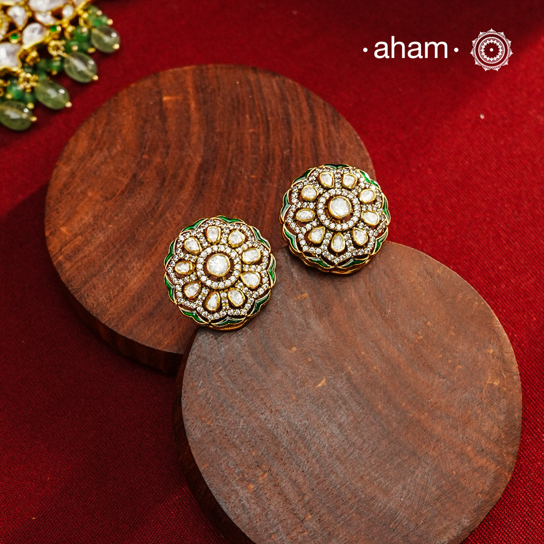 Expertly crafted studs feature 92.5% sterling silver with a fine gold polish finish, elegantly set with brilliant moissanite stones. Designed to offer lasting shine and sophistication making them a perfect choice for both everyday wear and special occasions.  . 