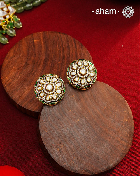 Expertly crafted studs feature 92.5% sterling silver with a fine gold polish finish, elegantly set with brilliant moissanite stones. Designed to offer lasting shine and sophistication making them a perfect choice for both everyday wear and special occasions.  . 