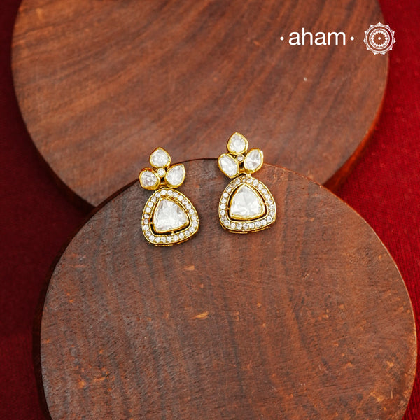 These expertly crafted studs feature 92.5% sterling silver with a refined gold polish finish, elegantly set with brilliant moissanite stones. Designed to offer lasting shine and sophistication making them a perfect choice for both everyday wear and special occasions. 