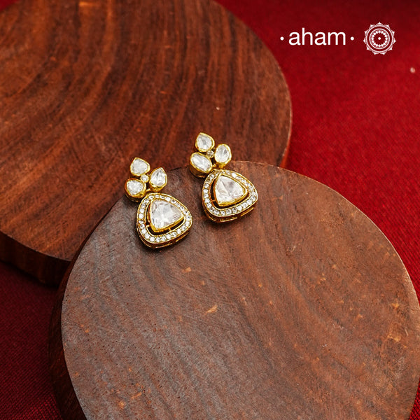These expertly crafted studs feature 92.5% sterling silver with a refined gold polish finish, elegantly set with brilliant moissanite stones. Designed to offer lasting shine and sophistication making them a perfect choice for both everyday wear and special occasions. 