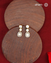 These expertly crafted studs feature 92.5% sterling silver with a fine gold polish finish, elegantly set with brilliant moissanite stones. Designed to offer lasting shine and sophistication making them a perfect choice for both everyday wear and special occasions.
