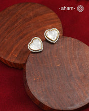 These expertly crafted studs feature 92.5% sterling silver with a fine gold polish finish, elegantly set with brilliant moissanite stones. Designed to offer lasting shine and sophistication making them a perfect choice for both everyday wear and special occasions.  