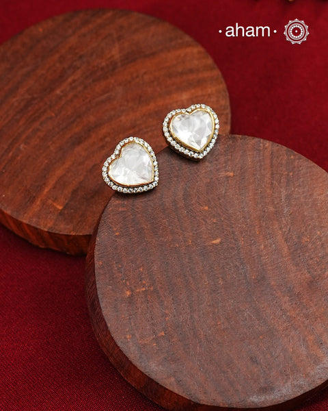 These expertly crafted studs feature 92.5% sterling silver with a fine gold polish finish, elegantly set with brilliant moissanite stones. Designed to offer lasting shine and sophistication making them a perfect choice for both everyday wear and special occasions.  