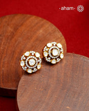 Expertly crafted studs in 92.5% sterling silver with a fine gold polish finish and elegantly set with brilliant moissanite stones. Designed to offer lasting shine and sophistication making them a perfect choice for special occasions. 