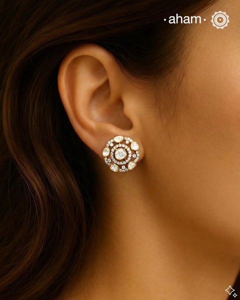 Expertly crafted studs in 92.5% sterling silver with a fine gold polish finish and elegantly set with brilliant moissanite stones. Designed to offer lasting shine and sophistication making them a perfect choice for special occasions.