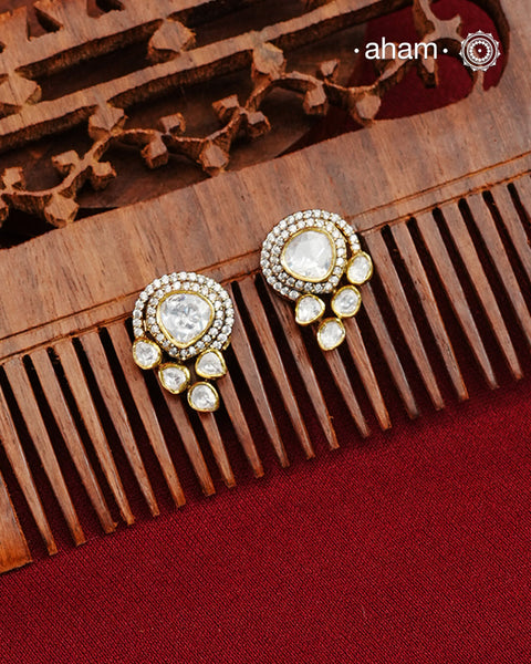 These expertly crafted studs feature 92.5% sterling silver with a fine gold polish finish and elegantly set with brilliant moissanite stones. Designed to offer lasting shine and sophistication making them a perfect choice for both everyday wear and special occasions.  