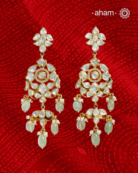 These expertly crafted studs feature 92.5% sterling silver with a fine gold polish finish and elegantly set with brilliant moissanite stones Designed to offer lasting shine and sophistication making them a perfect choice for your special occasions.  