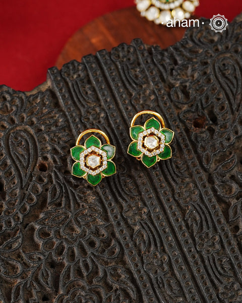 Expertly crafted studs in 92.5% sterling silver with a fine gold polish finish, elegantly set with brilliant moissanite stones and a lustrous pink stones. Designed to offer lasting shine and sophistication making them a perfect choice for special occasions.