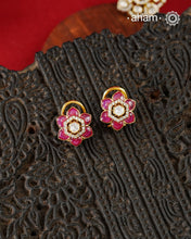 Expertly crafted studs in 92.5% sterling silver with a fine gold polish finish, elegantly set with brilliant moissanite stones and a lustrous pink stones. Designed to offer lasting shine and sophistication making them a perfect choice for special occasions.