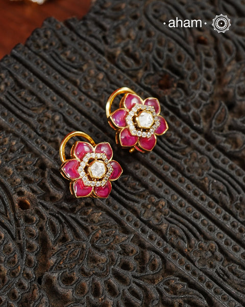 Expertly crafted studs in 92.5% sterling silver with a fine gold polish finish, elegantly set with brilliant moissanite stones and a lustrous pink stones. Designed to offer lasting shine and sophistication making them a perfect choice for special occasions.