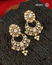 Expertly crafted Chandbali in sterling silver with a fine gold polish finish and elegantly set with brilliant Moissanite stones. Crafted in 92.5 silver with a rich gold polish, it offers exceptional sparkle and timeless versatility. A beautiful choice for festive occasions, weddings, and celebratory dressing.