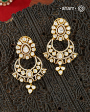 Expertly crafted Chandbali in sterling silver with a fine gold polish finish and elegantly set with brilliant Moissanite stones. Crafted in 92.5 silver with a rich gold polish, it offers exceptional sparkle and timeless versatility. A beautiful choice for festive occasions, weddings, and celebratory dressing.&nbsp;