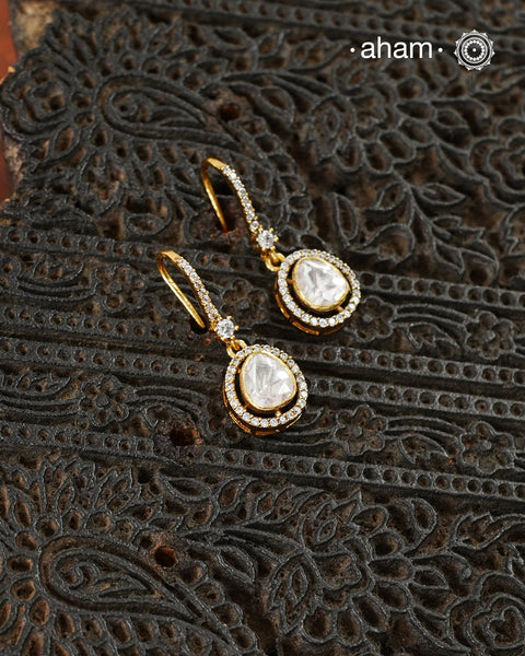 Expertly crafted studs in 92.5% sterling silver with a fine gold polish finish and elegantly set with brilliant moissanite stones Designed to offer lasting shine and sophistication making them a perfect choice for special occasions.