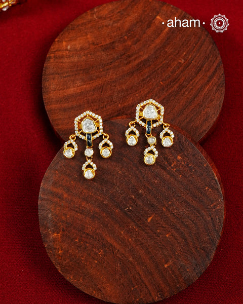 A classic silhouette elevated with exquisite detailing, these earrings are handcrafted in 92.5 sterling silver, finished with a radiant gold polish and set with brilliant moissanite stones. Perfect for effortless day-to-evening styling, they bring understated elegance to every look.