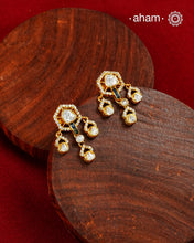 A classic silhouette elevated with exquisite detailing, these earrings are handcrafted in 92.5 sterling silver, finished with a radiant gold polish and set with brilliant moissanite stones. Perfect for effortless day-to-evening styling, they bring understated elegance to every look.