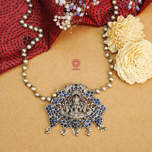 Dazzle up your look in this One of a kind goddess Lakshmi in a canopy neckpiece. Handcrafted with love in 92.5 sterling silver with long silver ball chain and dangling cultured pearls. 