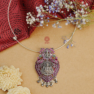 Dazzle up your look in this One of a kind goddess Lakshmi in a canopy neckpiece. Handcrafted with love in 92.5 sterling silver with long silver ball chain and dangling cultured pearls. 