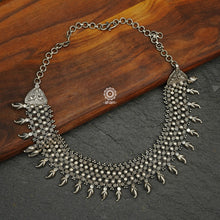 Mewad Silver Neckpiece crafted in 92.5 silver. With beautiful repetitive patterns and ghunroos. 
