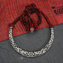 Handmade Chitai work 92.5 Sterling silver hasli.  Can be worn both ways and comes with adjustable thread for ease of wearing. A bestseller and a classic piece that has stood the test of time and is bound to become a family heirloom. 