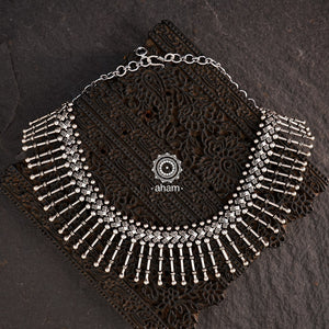 This Mewad Silver Neckpiece is crafted with 92.5 silver and is the perfect addition to your Navratri wardrobe. It can be worn alone or layered, making it a versatile and stylish accessory for any occasion.