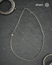 Handcrafted 92.5 sterling silver chain with a small meena bead on one side.Simple designs that add some much value to your everyday dressing.