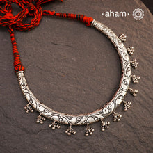 Handmade Chitai work 92.5 Sterling silver hasli with ghurnroos and kemp stones.Can be worn both ways and comes with adjustable thread for ease of wearing. A bestseller and a classic piece that has stood the test of time and is bound to become a family heirloom.