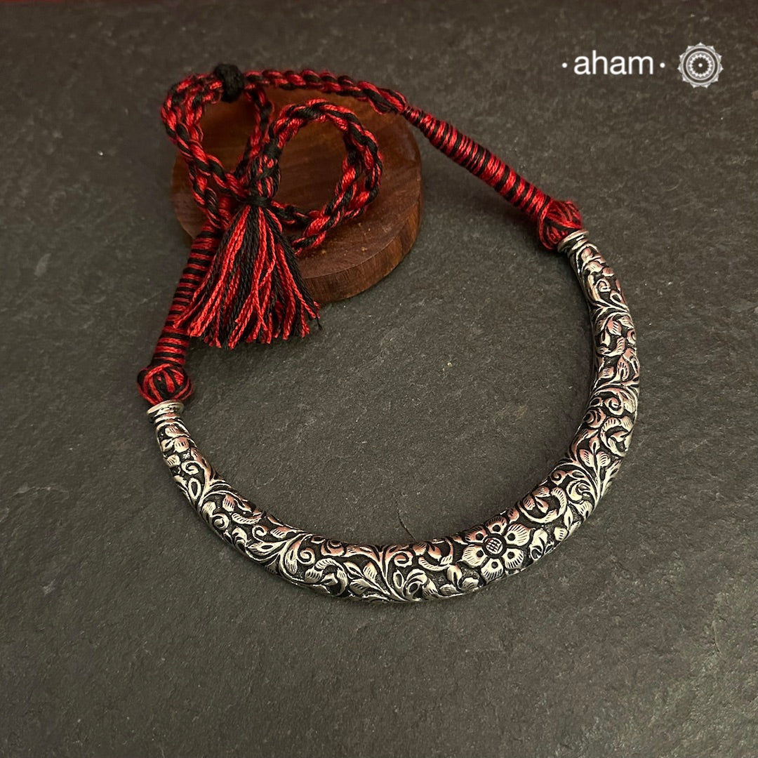 Handmade Chitai work 92.5 Sterling silver hasli.Can be worn both ways and comes with adjustable thread for ease of wearing.A bestseller and a classic piece that has stood the test of time and is bound to become a family heirloom.