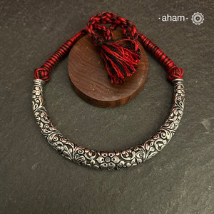 Handmade Chitai work 92.5 Sterling silver hasli.Can be worn both ways and comes with adjustable thread for ease of wearing.A bestseller and a classic piece that has stood the test of time and is bound to become a family heirloom.