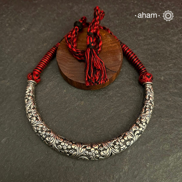 Handmade Chitai work 92.5 Sterling silver hasli.Can be worn both ways and comes with adjustable thread for ease of wearing.A bestseller and a classic piece that has stood the test of time and is bound to become a family heirloom.