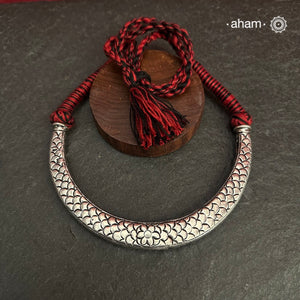 Handmade Chitai work 92.5 Sterling silver hasli.Can be worn both ways and comes with adjustable thread for ease of wearing.A bestseller and a classic piece that has stood the test of time and is bound to become a family heirloom.