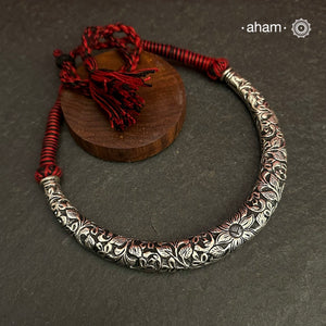 Handmade Chitai work 92.5 Sterling silver hasli.Can be worn both ways and comes with adjustable thread for ease of wearing.A bestseller and a classic piece that has stood the test of time and is bound to become a family heirloom.