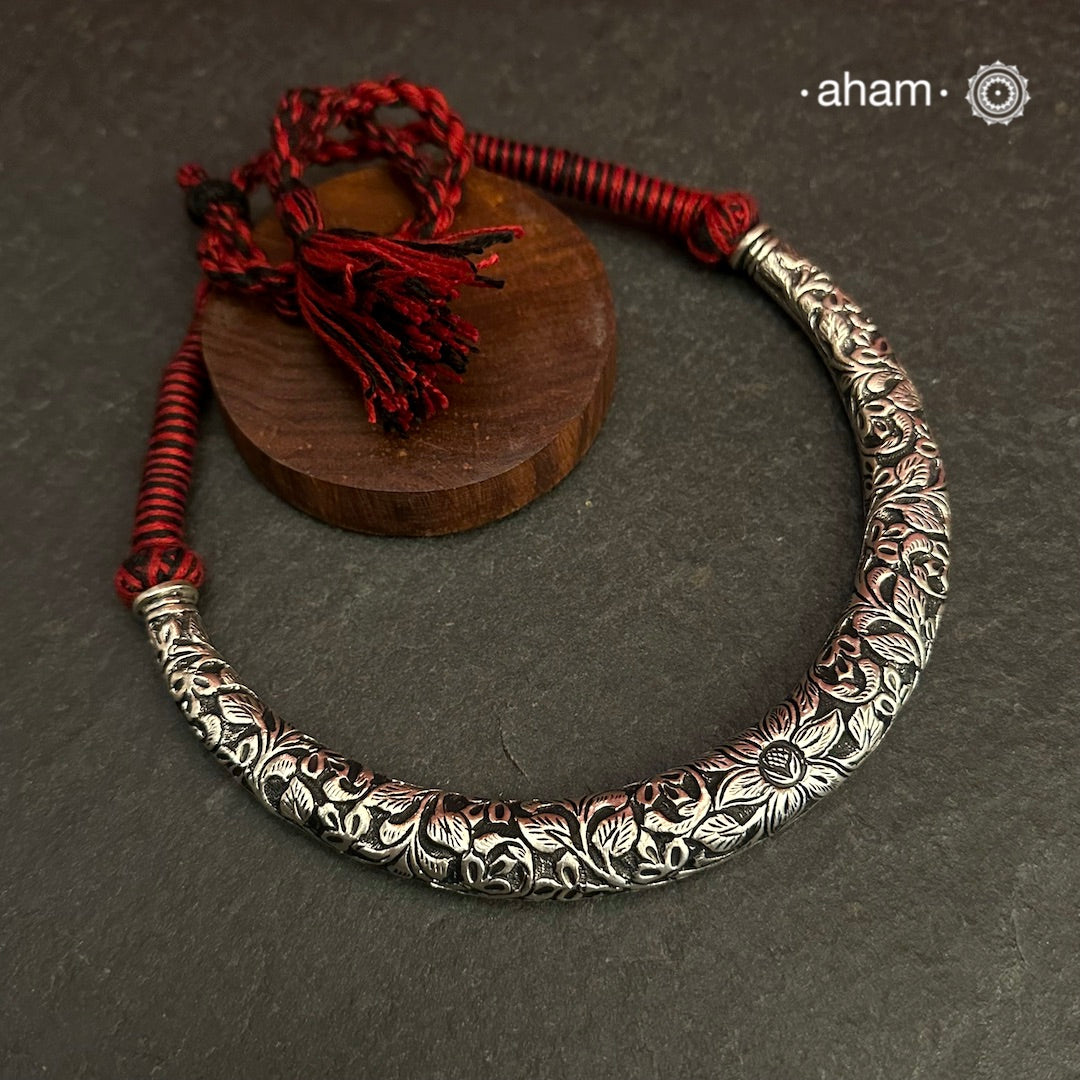 Handmade Chitai work 92.5 Sterling silver hasli.Can be worn both ways and comes with adjustable thread for ease of wearing.A bestseller and a classic piece that has stood the test of time and is bound to become a family heirloom.