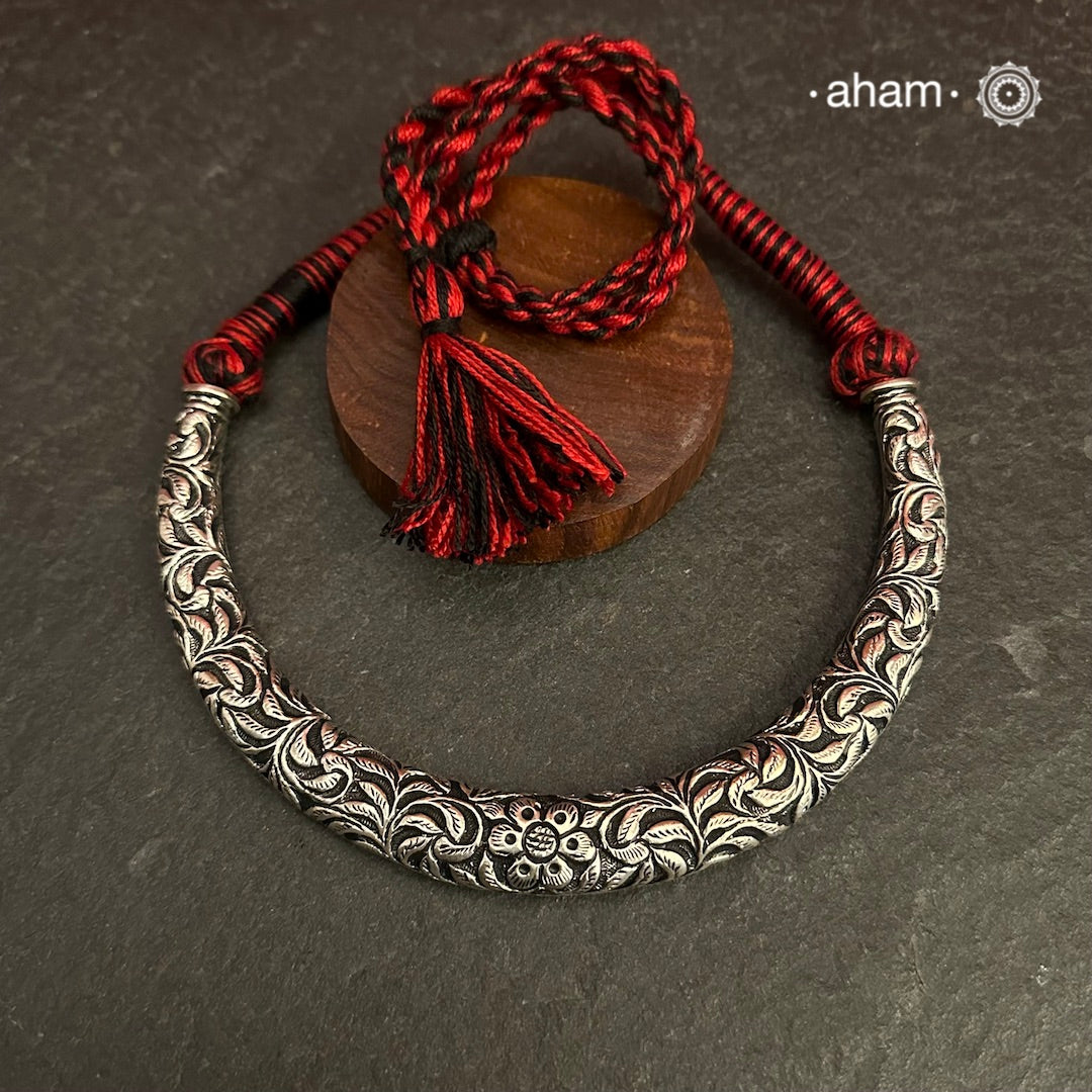 Handmade Chitai work 92.5 Sterling silver hasli.Can be worn both ways and comes with adjustable thread for ease of wearing. A bestseller and a classic piece that has stood the test of time and is bound to become a family heirloom.