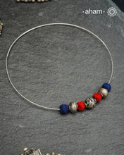 Everyday Wear Silver neckpiece in 92.5 silver in Wire Hasli and three beautiful silver balls interspersed with bright cotton balls. Easy to wear, looks great with Indian and Western outfits. The Hasli is easily removable and can be used with any other pendant as well.