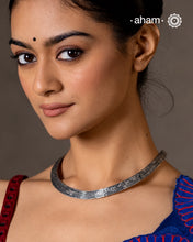 Discover the Collar Silver Hasli, a classic handcrafted Indian silver neckpiece made in 92.5 silver. Designed with a clean collar-style silhouette, this versatile Hasli is an elegant choice for everyday wear as well as Navratri and festive dressing. Its distinctive traditional form pairs beautifully with chaniya choli, Bandhani, sarees, handloom outfits and contemporary Indian wear. A timeless silver statement for women who appreciate the character of traditional Indian jewellery.