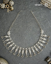 Elevate your collection with this exquisite Mewad Silver Neckpiece meticulously crafted from 92.5 sterling silver. The piece showcases intricate detailing while remaining remarkably lightweight. Whether you're curating your personal wardrobe or seeking a thoughtful gift for someone discerning, this handcrafted ensemble delivers timeless sophistication and refined craftsmanship.