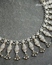 Elevate your collection with this exquisite Mewad Silver Neckpiece meticulously crafted from 92.5 sterling silver. The piece showcases intricate detailing while remaining remarkably lightweight. Whether you're curating your personal wardrobe or seeking a thoughtful gift for someone discerning, this handcrafted ensemble delivers timeless sophistication and refined craftsmanship.