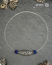 Everyday Wear Silver neckpiece in 92.5 silver in Wire Hasli with chitai bead and blue cotton balls. Easy to wear, looks great with Indian and Western outfits. The Hasli is easily openable and can be used with any other pendant as well.